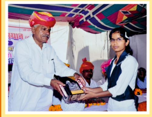Felicitating a student for academic achievement